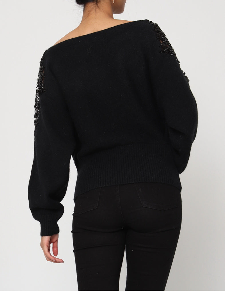 Oversized sweater with rhinestone embroidery