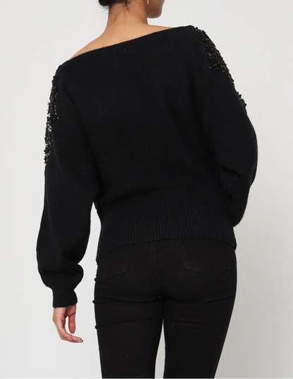 Oversized sweater with rhinestone embroidery