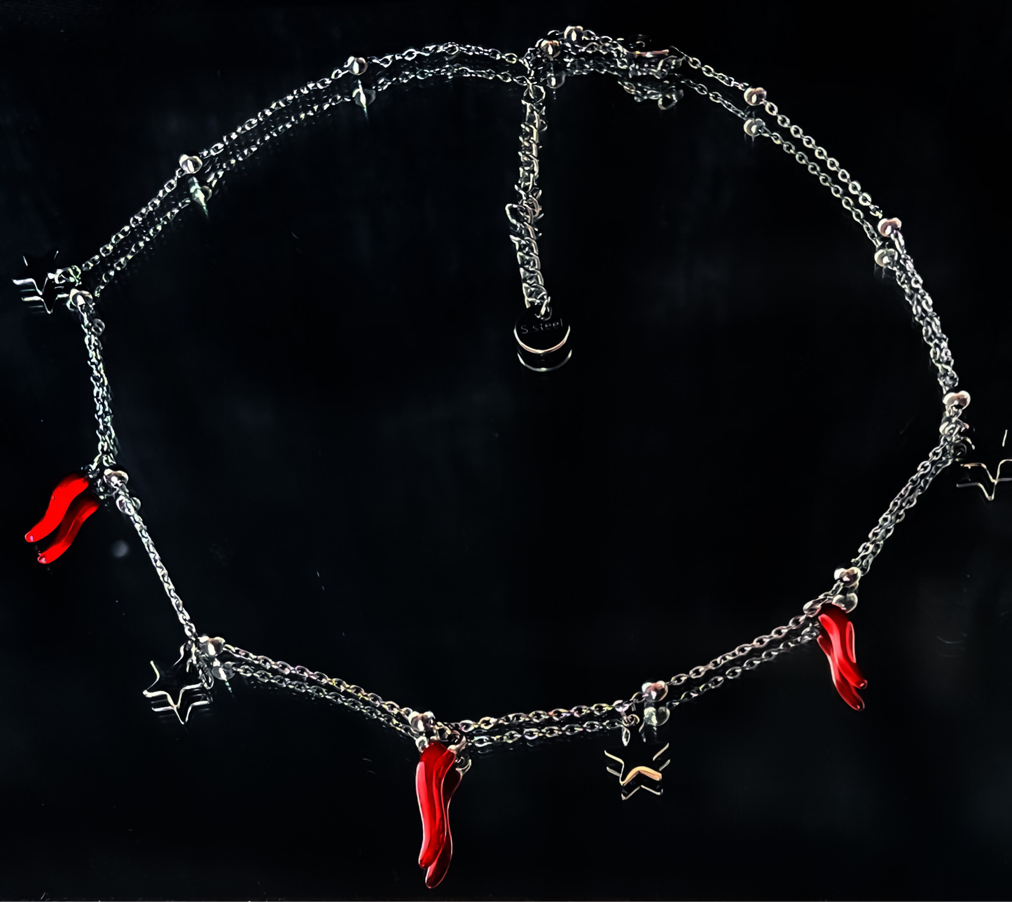 Collana portafortuna con charms stelle e cornetti rossi - Rodio
