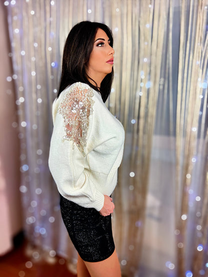 Oversized sweater with rhinestone embroidery